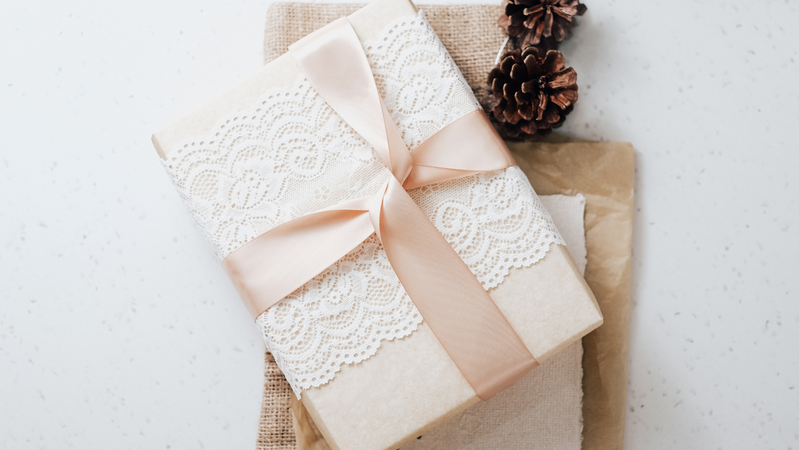 simple pretty gift in a white box with a silk pink ribbon